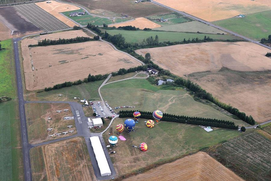 aerial view of Sequim Airport with hot air balloons